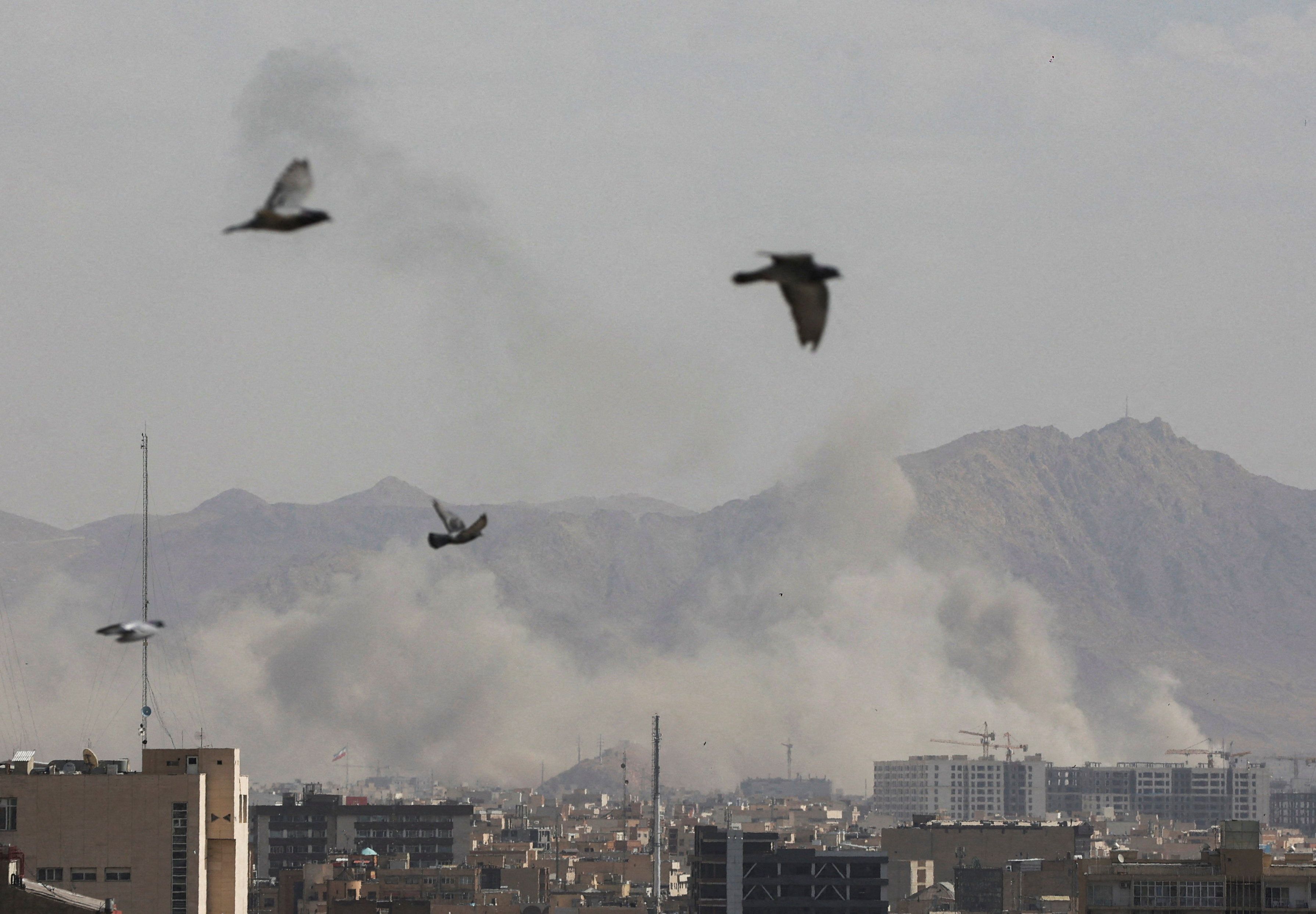 Smoke rises following an explosion in Tehran