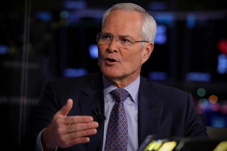 Darren Woods, CEO of ExxonMobil, speaks during an interview with CNBC on the floor at the New York Stock Exchange (NYSE) in New York City, U.S., December 7, 2023.