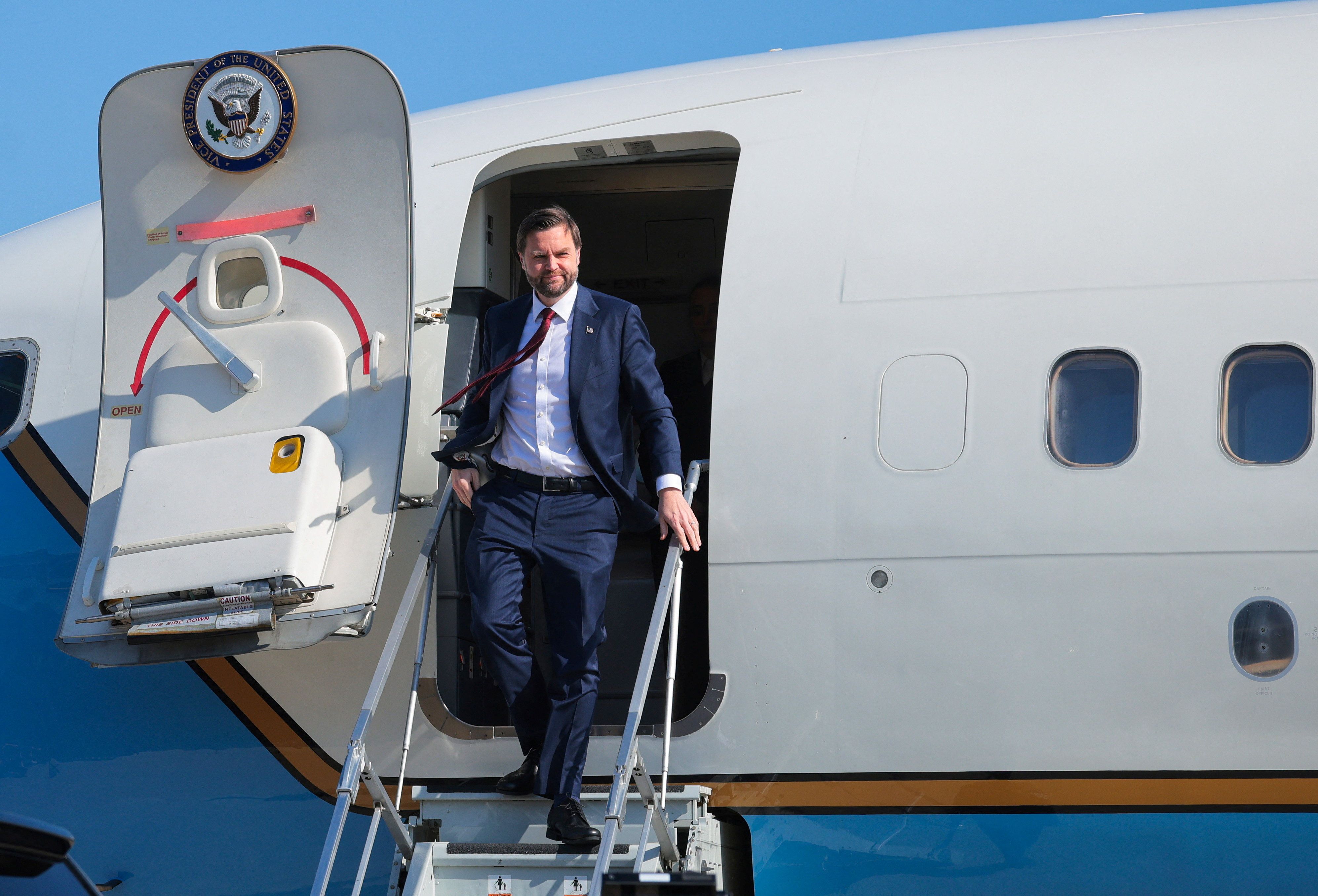 Vice President JD Vance disembarks a plane