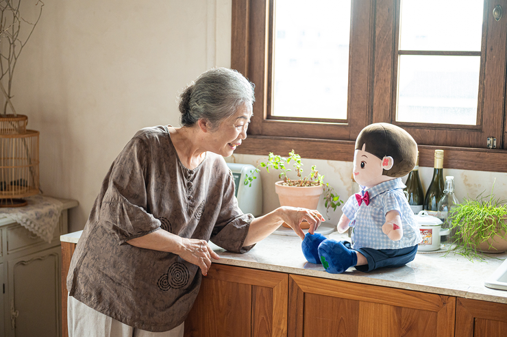 A Hyodol doll with an elderly woman.