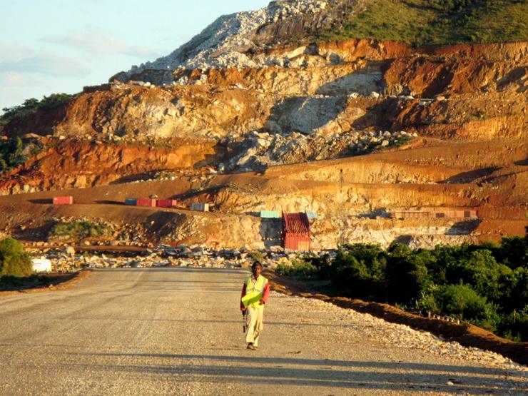 A Malagasy worker walks along an access track at mining giant Rio Tinto’s project.