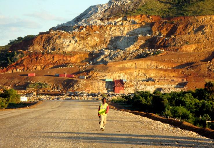A Malagasy worker walks along an access track at mining giant Rio Tinto’s project.