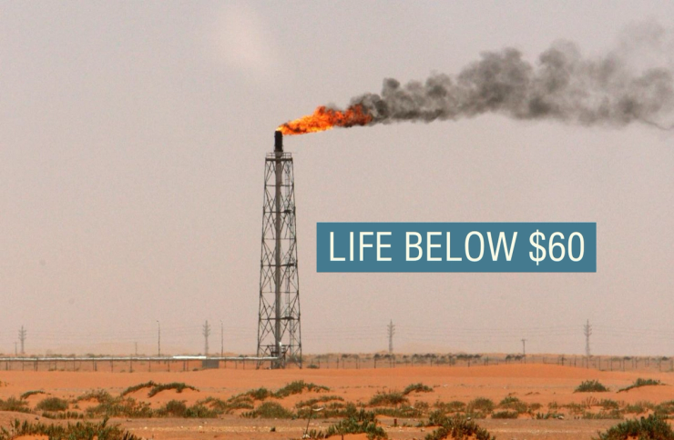 A gas flame is seen in the desert near the Khurais oilfield, about 160 km (99 miles) from Riyadh, June 23, 2008.