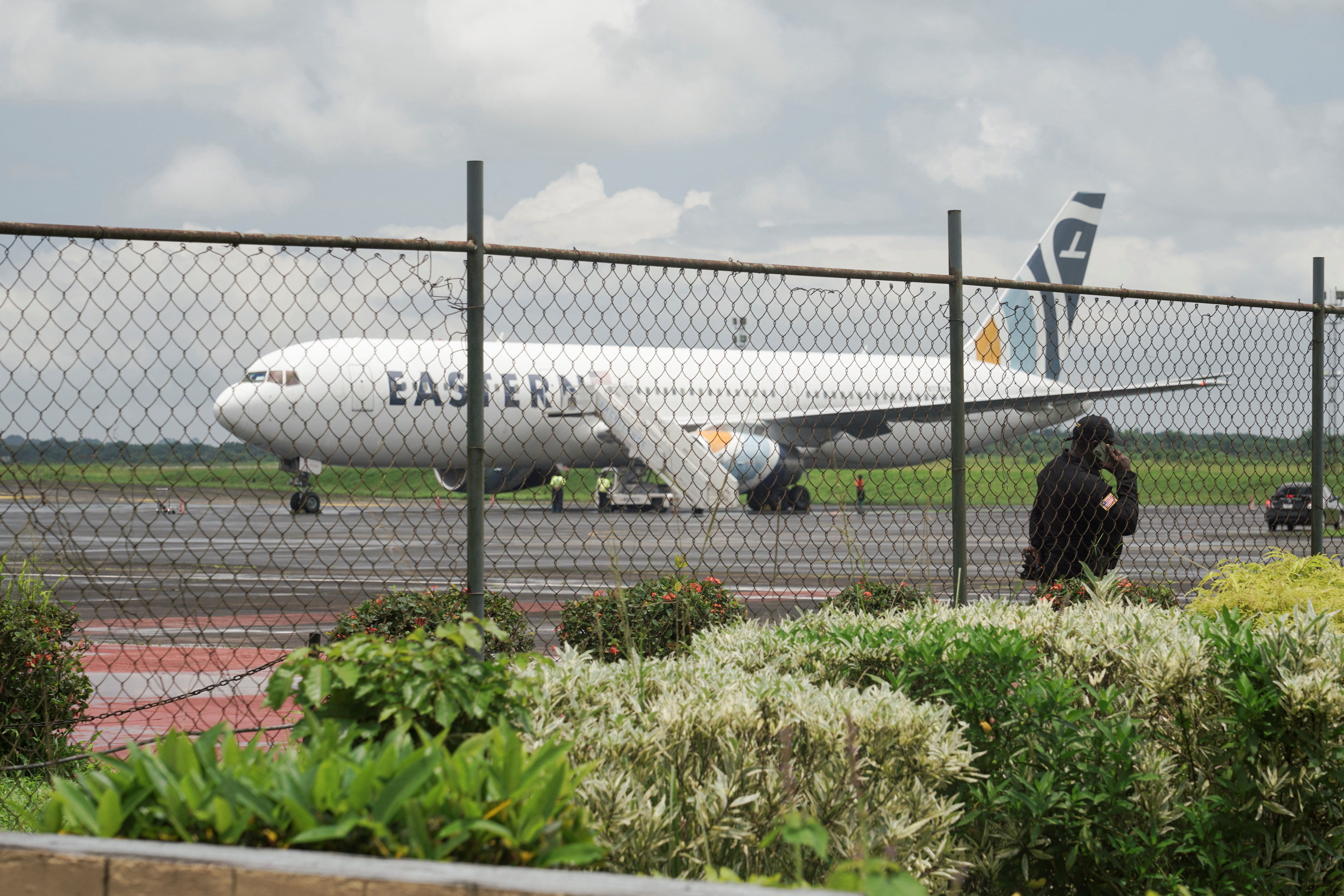 A plane carrying deportees from the United States arrives at Roberts International Airport, Harbel, near Monrovia, Liberia