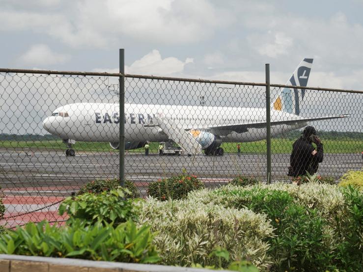 A plane carrying deportees from the United States arrives at Roberts International Airport, Harbel, near Monrovia, Liberia