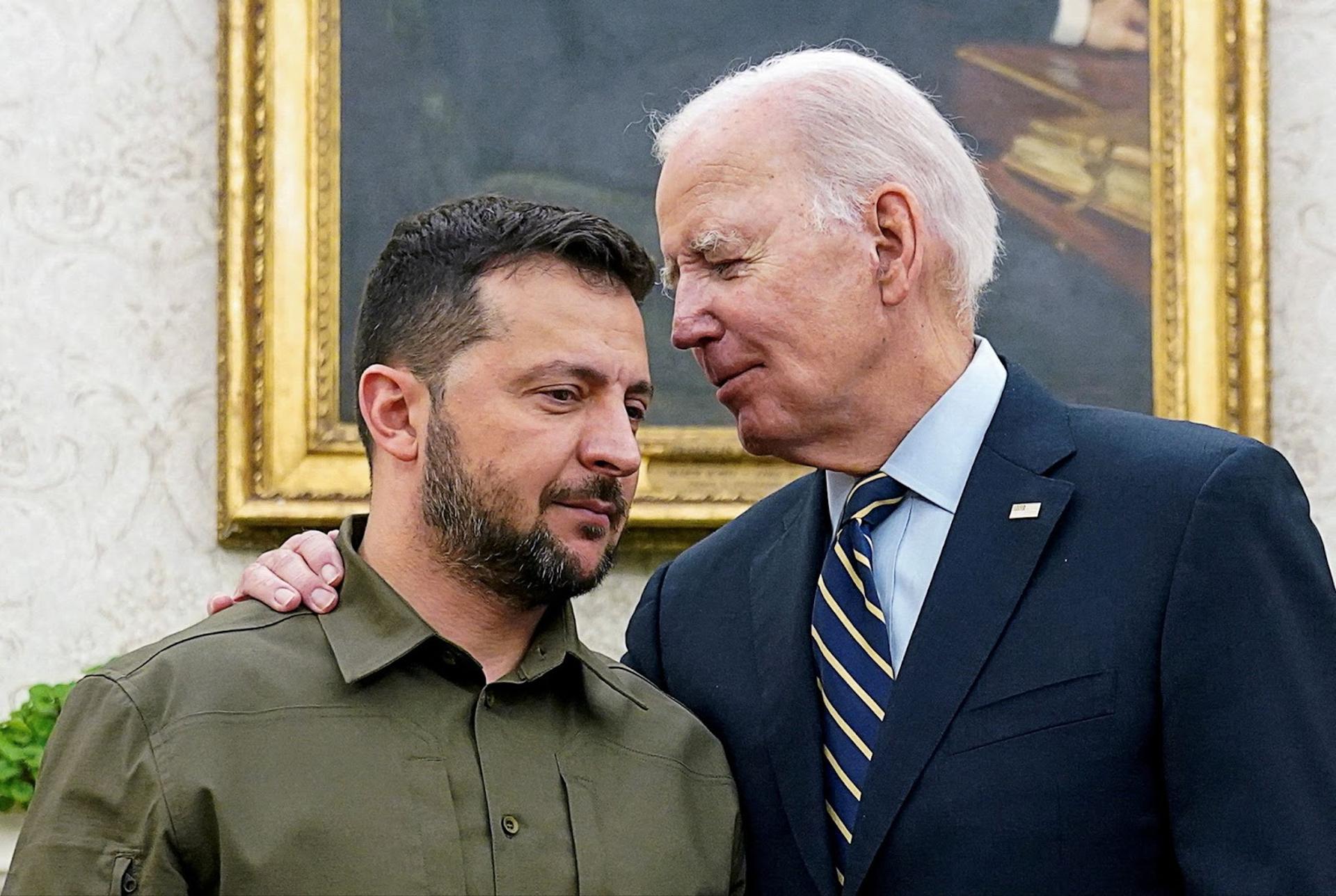 Volodymyrr Zelenskyy is embraced by Joe Biden in the Oval Office, Washington, DC