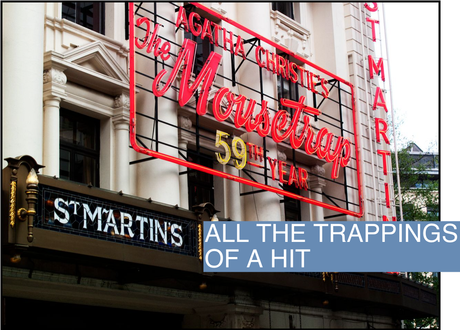 A neon sign advertising the 59th anniversary of The Mousetrap hangs above St. Martin's Theatre in London.