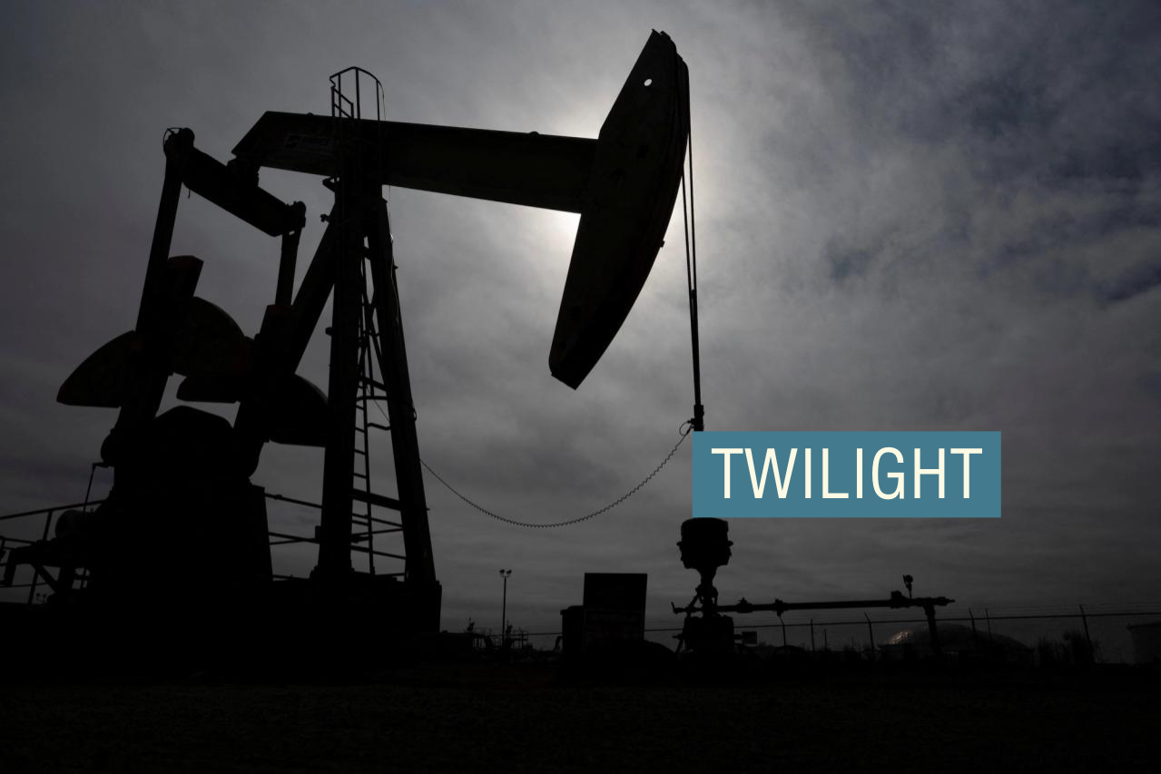 A pump jack operates near a crude oil reserve in the Permian Basin oil field near Midland, Texas,