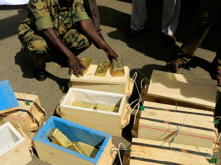 Sudanese Rapid Support Forces display gold bars seized from a plane that landed at Khartoum Airport in 2019.