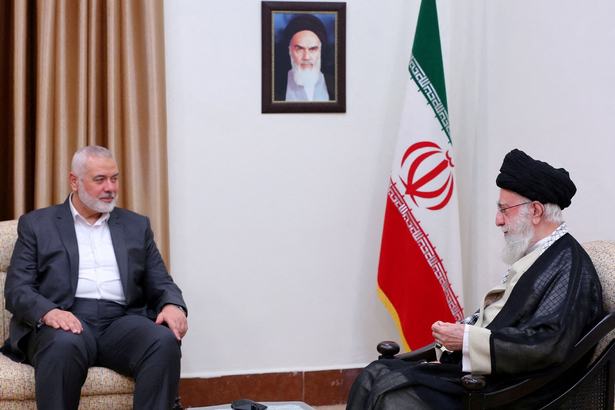 Iran’s Supreme Leader Ayatollah Ali Khamenei and Hamas’s political leader Ismail Haniyeh