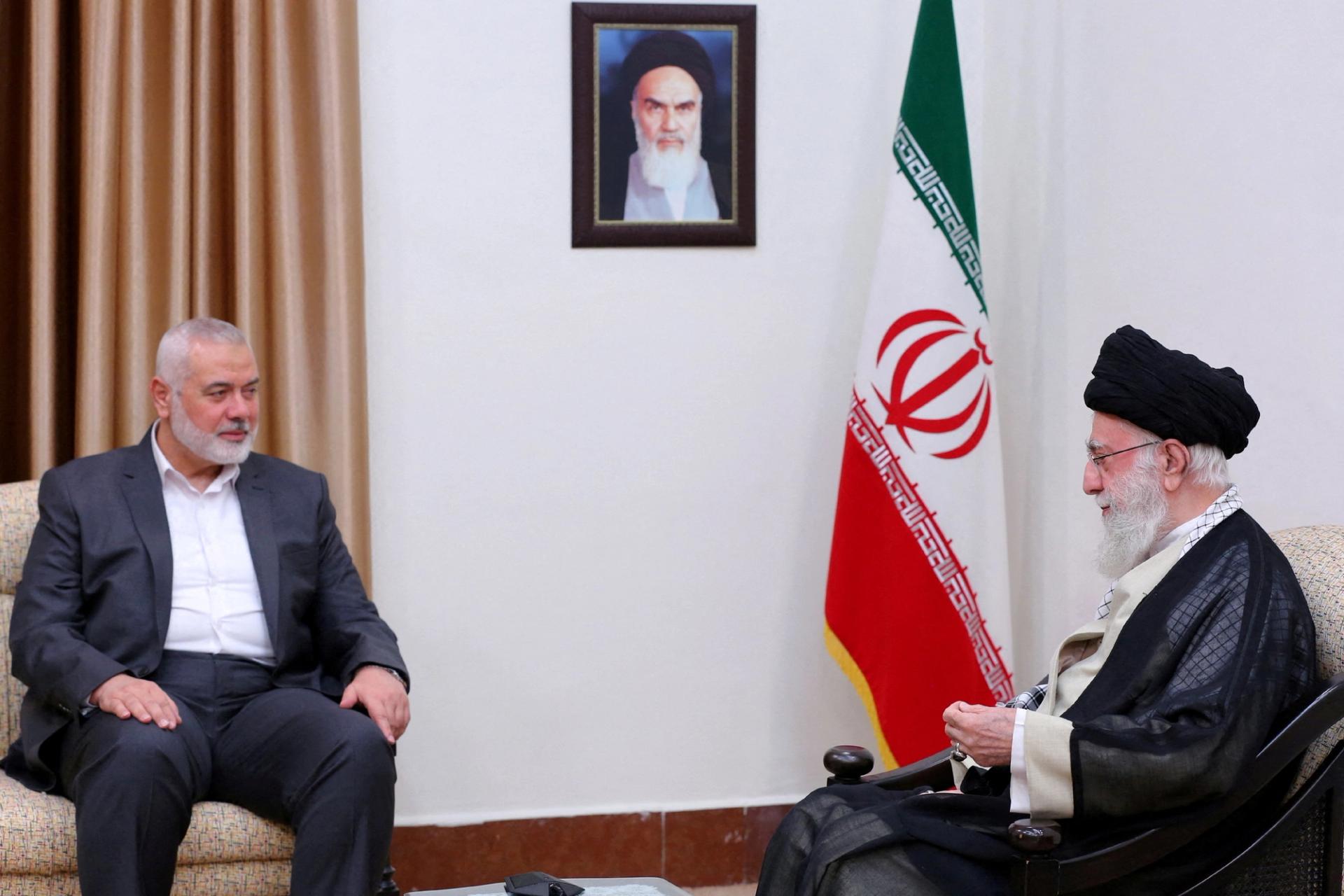 Iran's Supreme Leader Ayatollah Ali Khamenei and Hamas's political leader Ismail Haniyeh