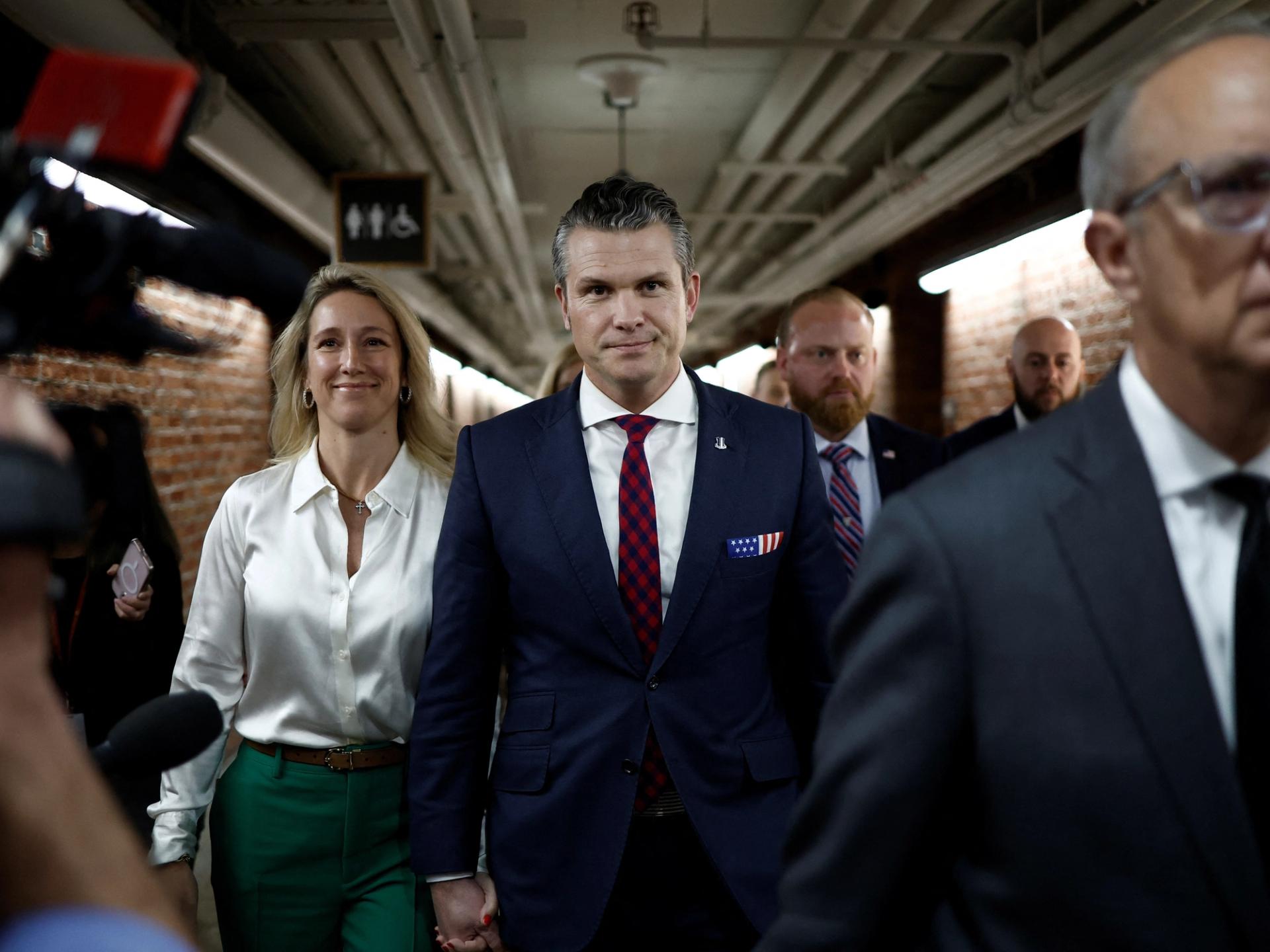 Pete Hegseth walks through the US Capitol