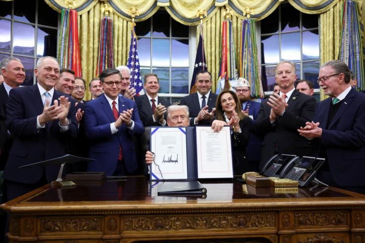 Donald Trump poses for a photo with senate members