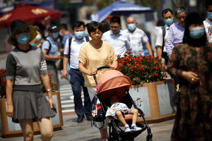 A woman with a stroller in Beiji
