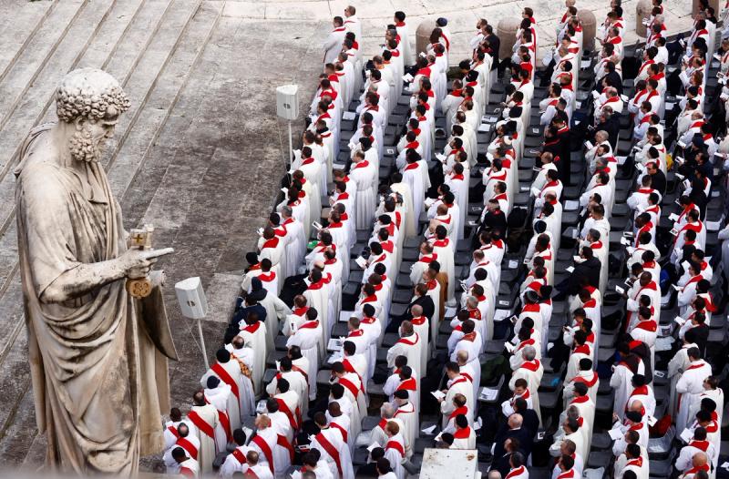 Members of the clergy attend the funeral of former Pope Benedict in St. Peter’s Square at the Vatican.