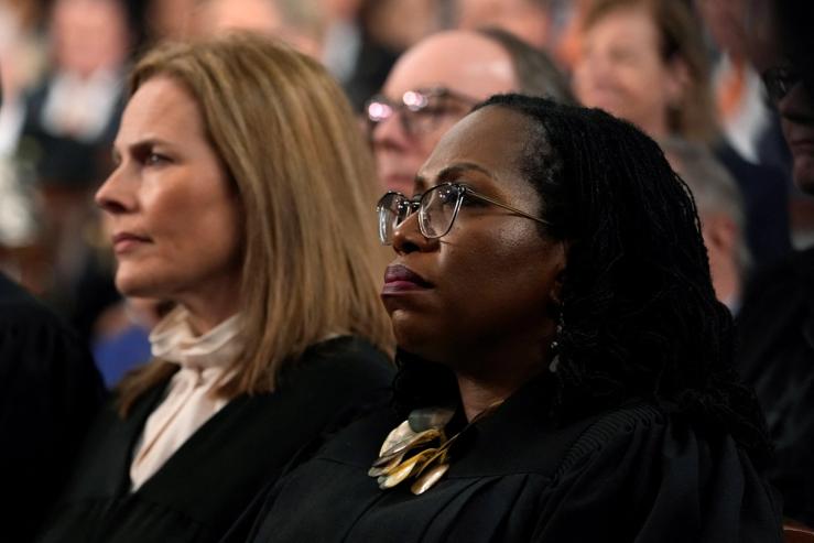 Justice Amy Coney Barrett and Justice Ketanji Brown Jackson listen as President Joe Biden delivers the State of the Union address to a joint session of Congress at the Capitol, Tuesday, Feb. 7, 2023, in Washington.