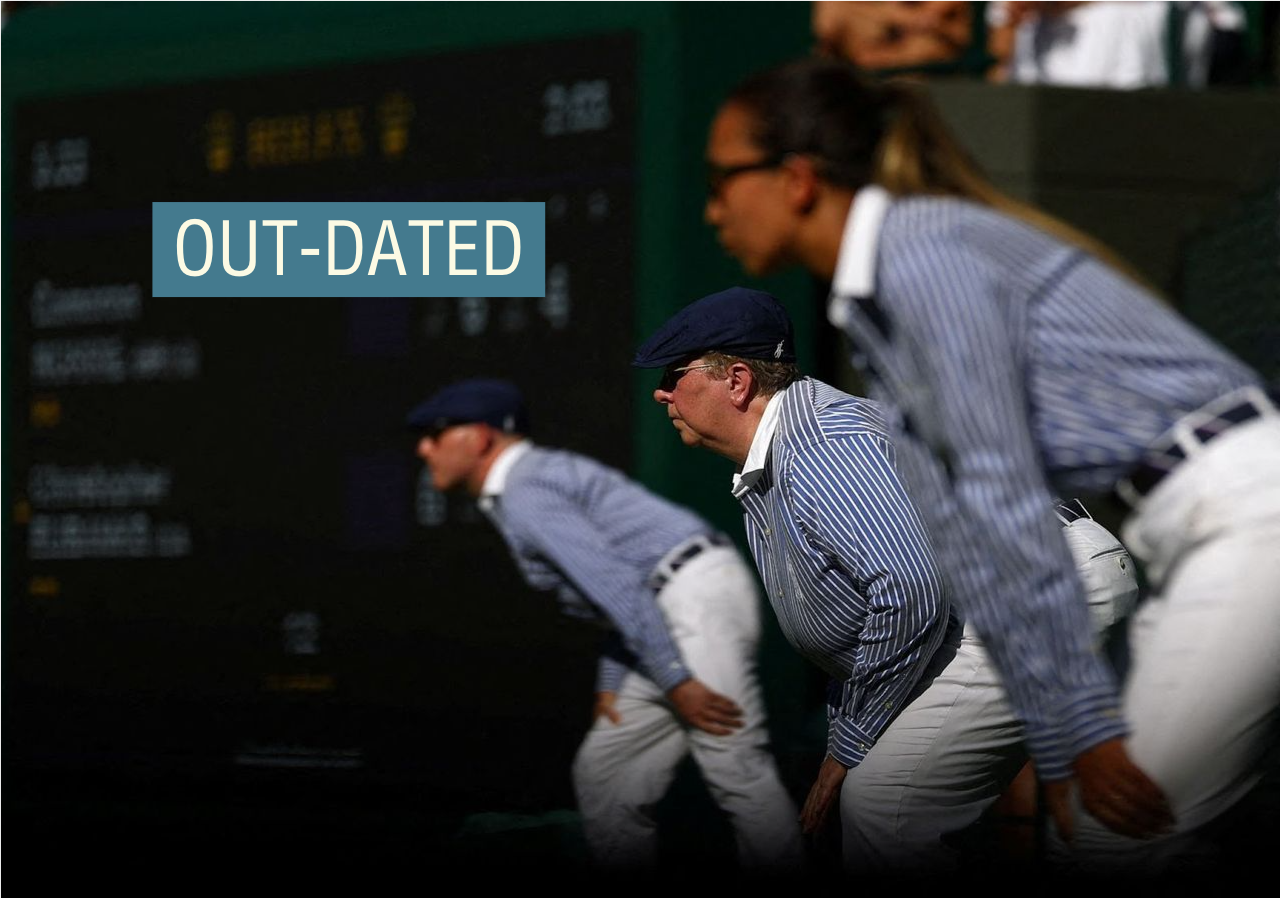 Line judges in their classic blue and white striped shirts.