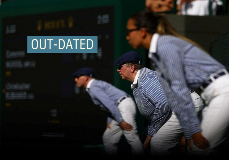 Line judges in their classic blue and white striped shirts.