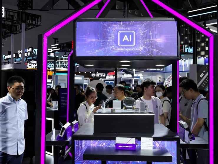People visit a Metax booth during the World Artificial Intelligence Conference in Shanghai, China.