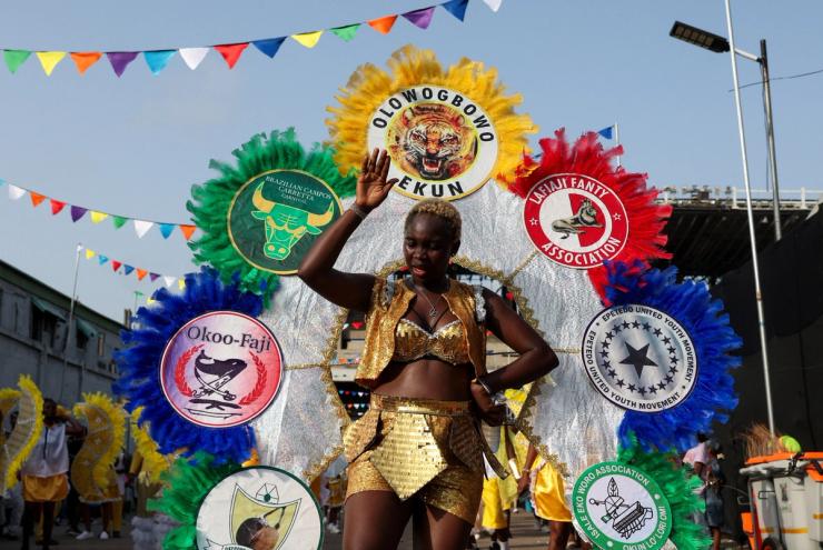 A woman participates in the Lagos Fanti Carnival parade.