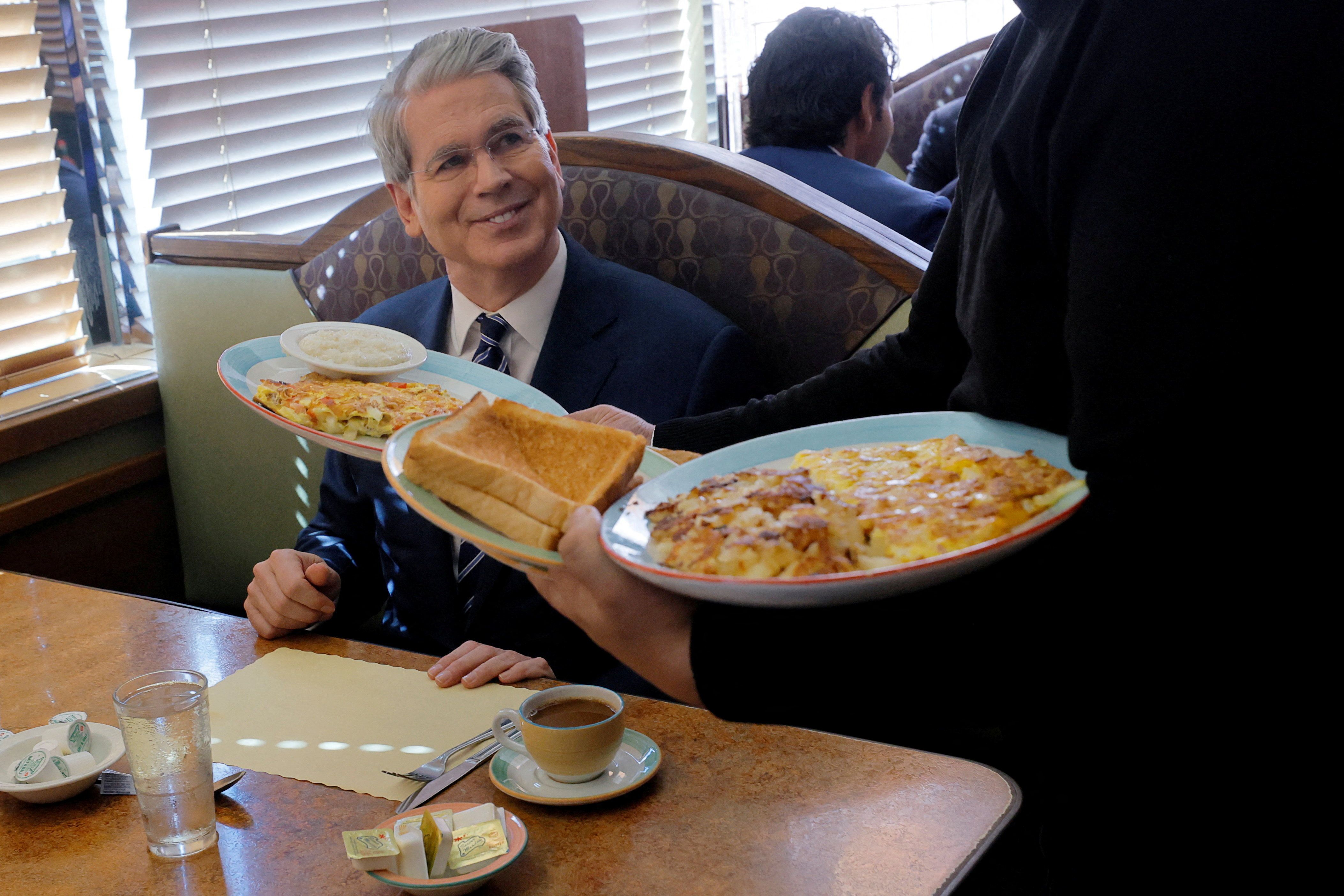 Scott Bessent is served at a diner