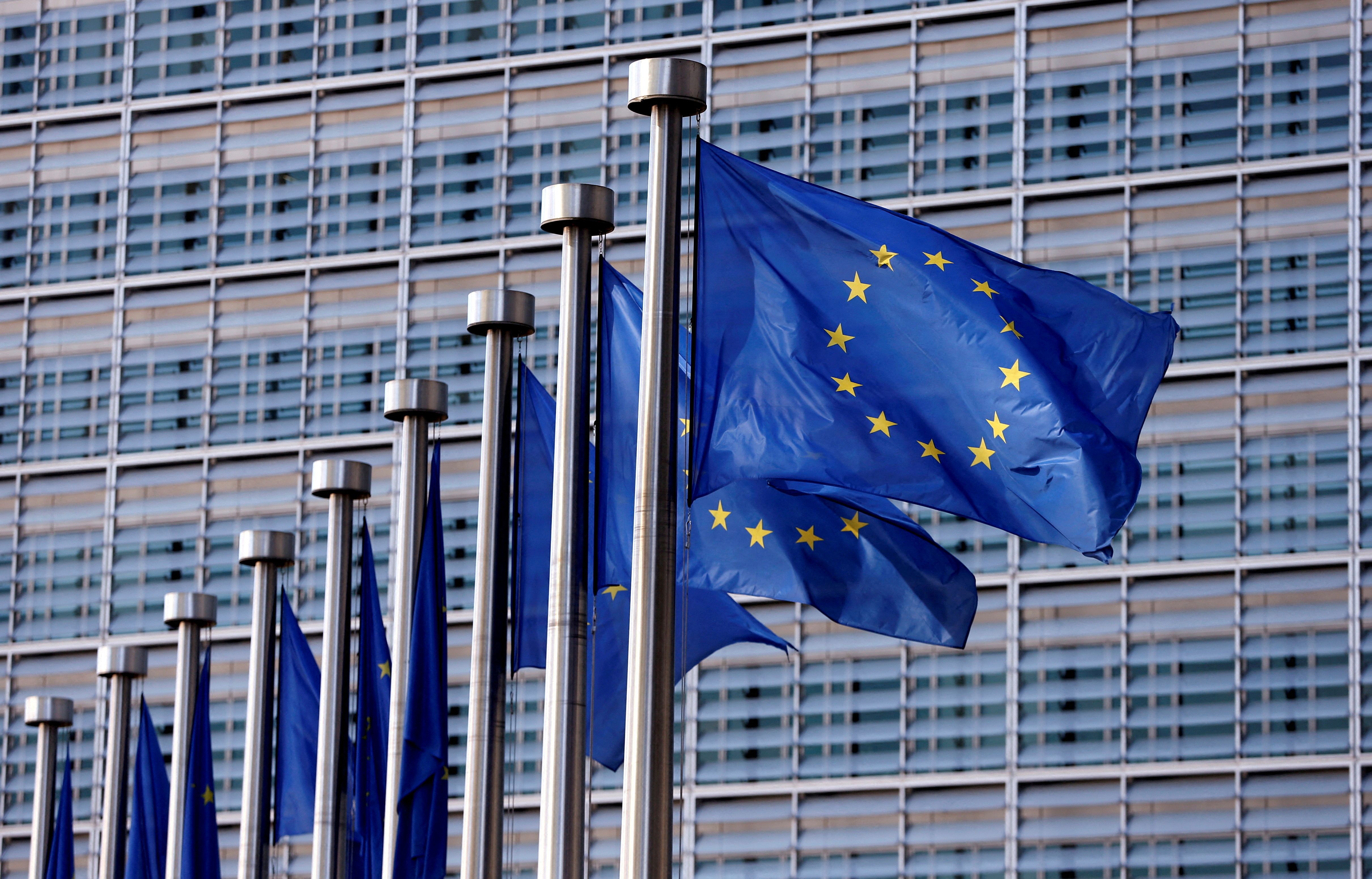 European Union flags outside the EU Commission headquarters in Brussels