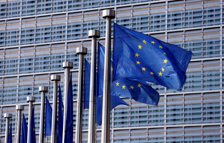 European Union flags outside the EU Commission headquarters in Brussels