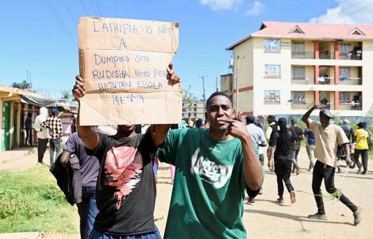 Demonstrators participate during a protest against a US-backed Ebola quarantine plan on the establishment of a 50-bed facility at a Kenyan air force base that was intended to host Americans exposed to Ebola, in Nanyuki town, in Laikipia County, Kenya June 1, 2026.