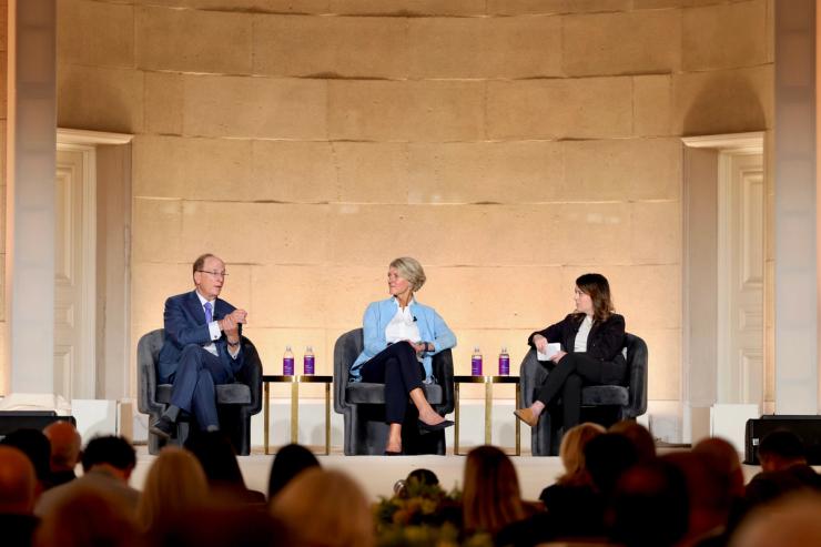 BlackRock CEO Larry Fink, Land O’Lakes CEO Beth Ford, and Semafor’s Liz Hoffman sit on stage