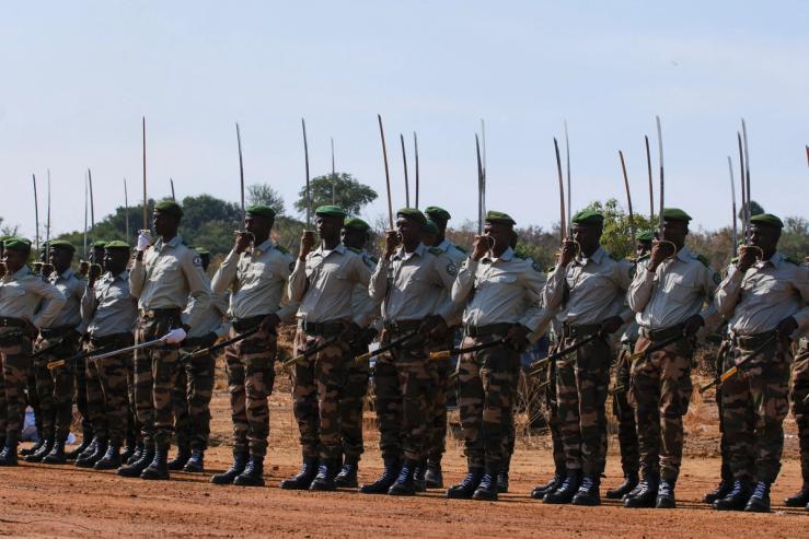 Military personnel stand in formation during the BAMEX′25 Defense Expo demo day event, in Koulikoro, Mali