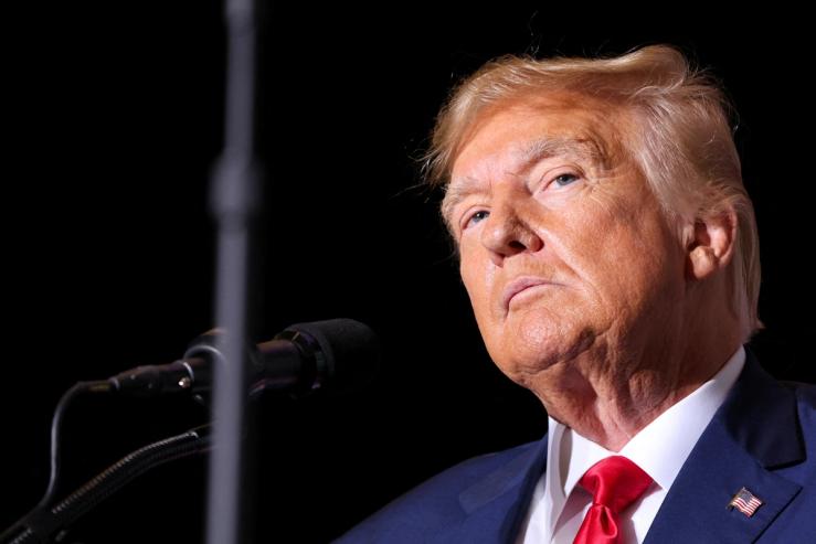 Donald Trump pauses as he speaks at a campaign event in Council Bluffs, Iowa, U.S., July 7, 2023.