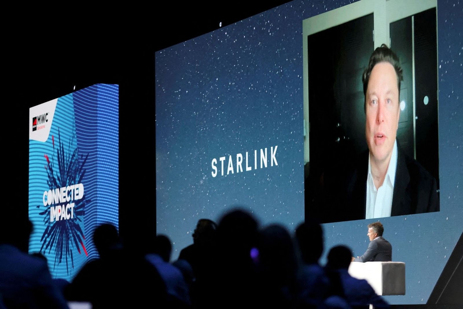 Elon Musk speaking about Starlink at an event. 