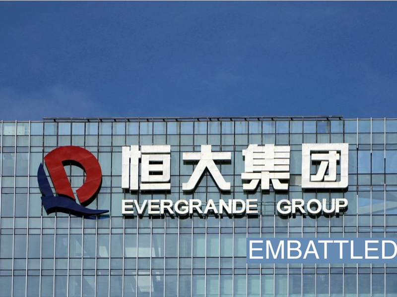 The company logo is seen on the headquarters of China Evergrande Group in Shenzhen, Guangdong province, China September 26, 2021. REUTERS/Aly Song/File Photo