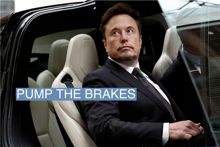 Tesla Chief Executive Officer Elon Musk gets in a Tesla car as he leaves a hotel in Beijing, China May 31, 2023. REUTERS/Tingshu Wang/File Photo