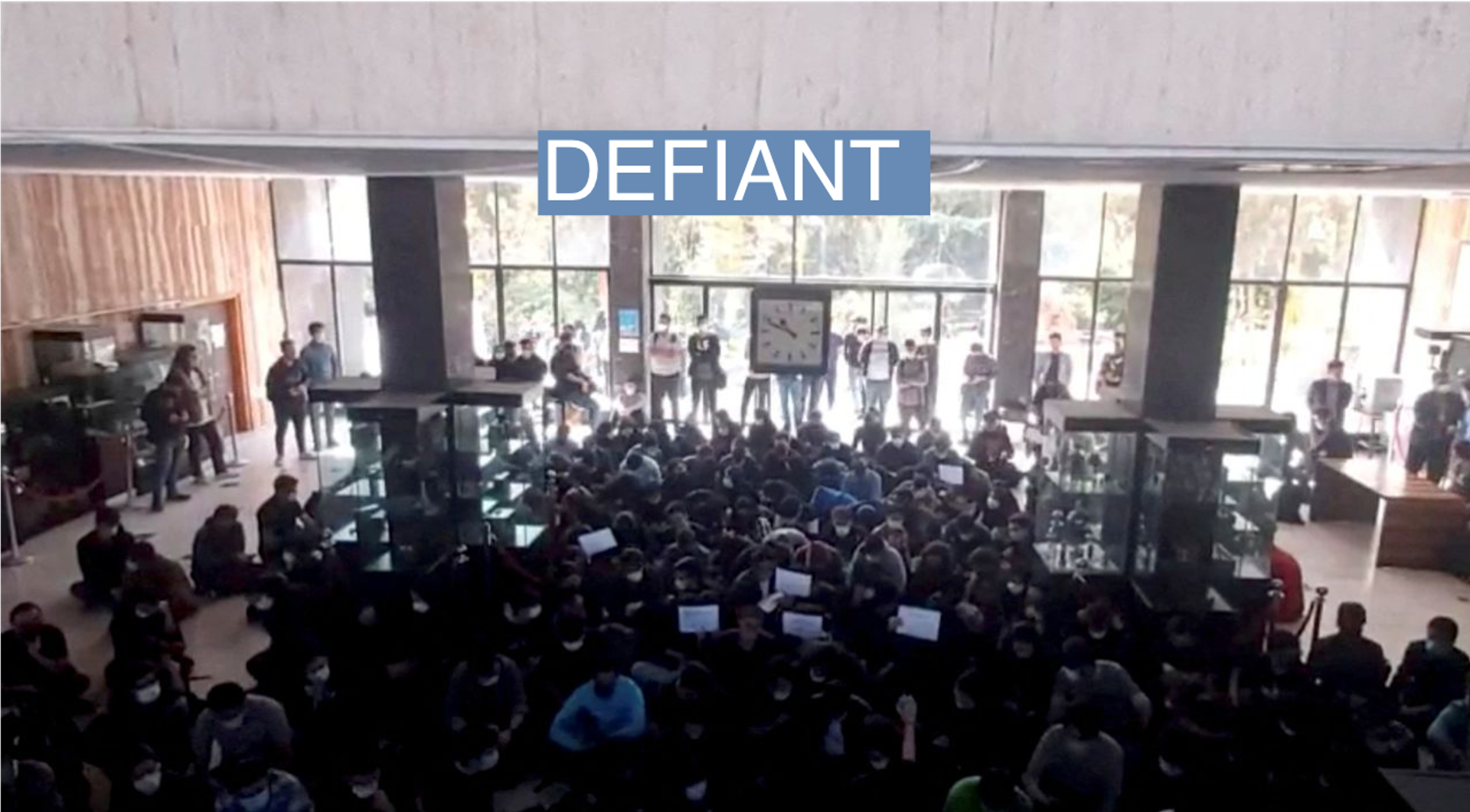 Protesters chant at a vigil for Mahsa Amini at the entrance hall of the Khajeh Nasir Toosi University of Technology in Tehran, Iran