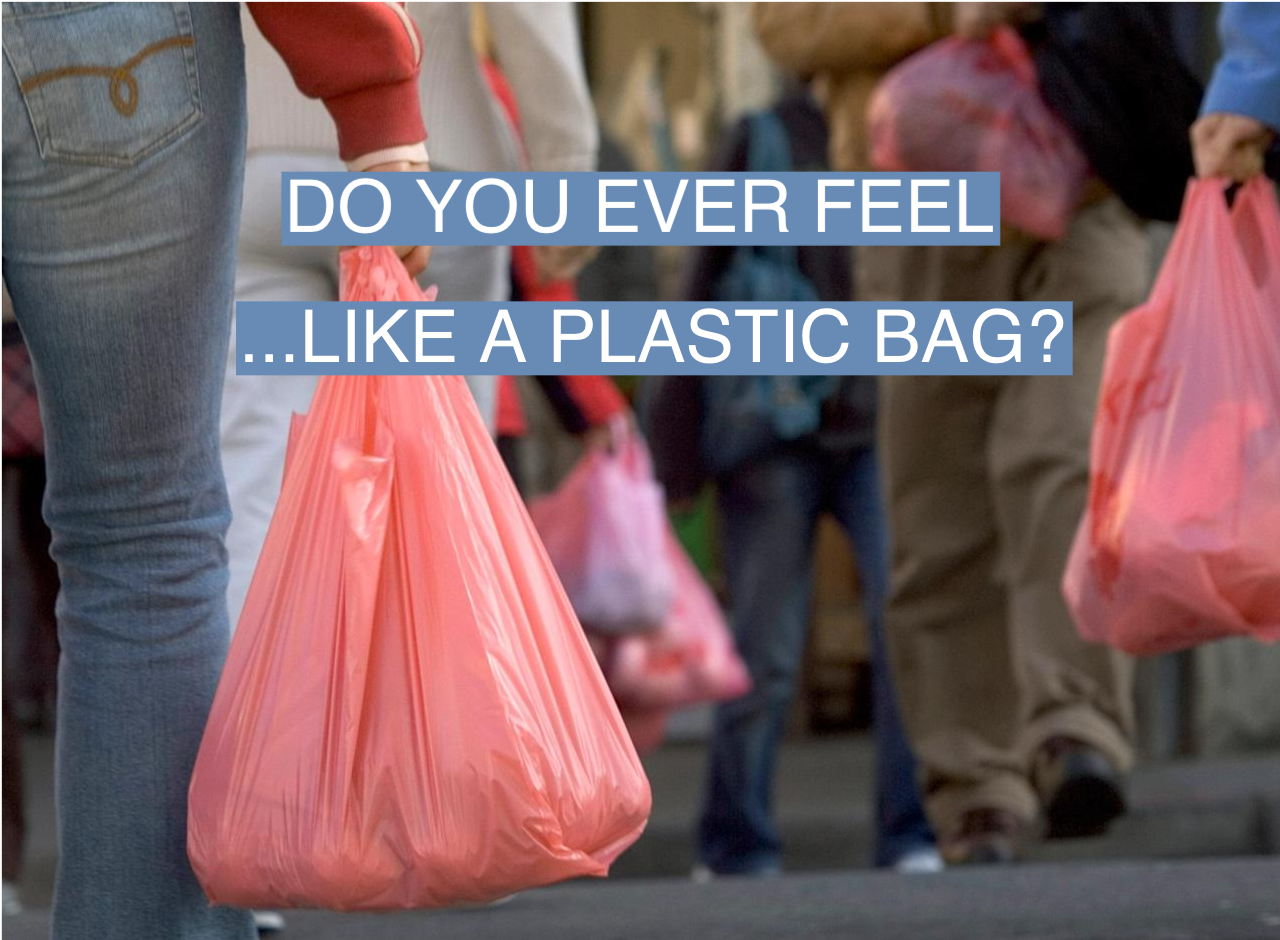 People walk with groceries in plastic bags in Chinatown on March 28, 2007, in San Francisco, Calif.