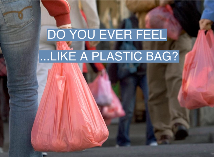 People walk with groceries in plastic bags in Chinatown on March 28, 2007, in San Francisco, Calif.
