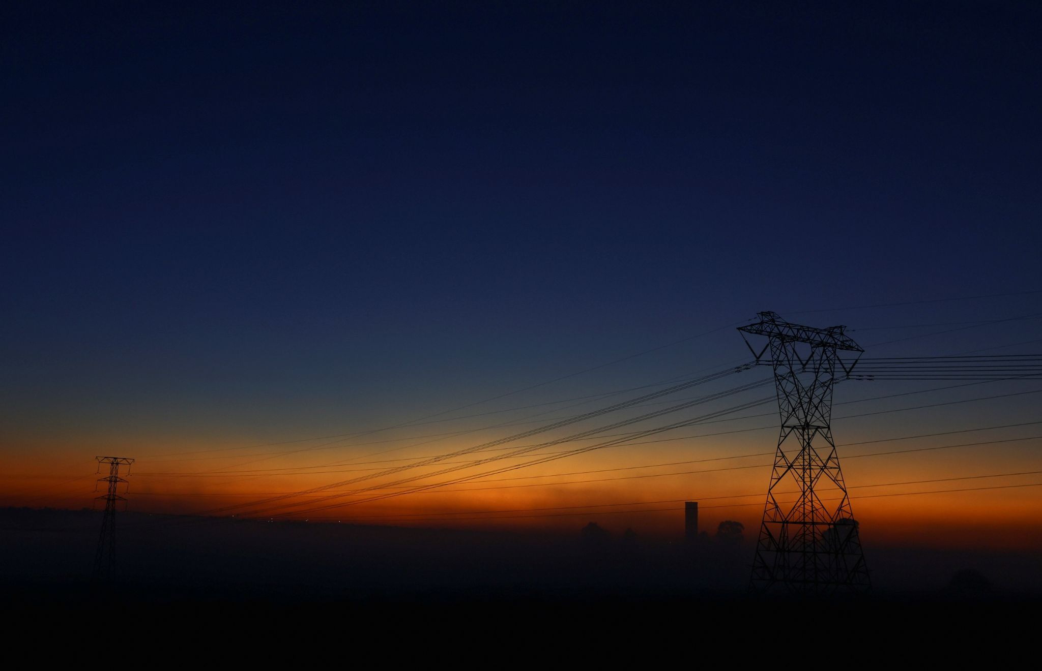 View of South African utility Eskom’s electricity pylons.