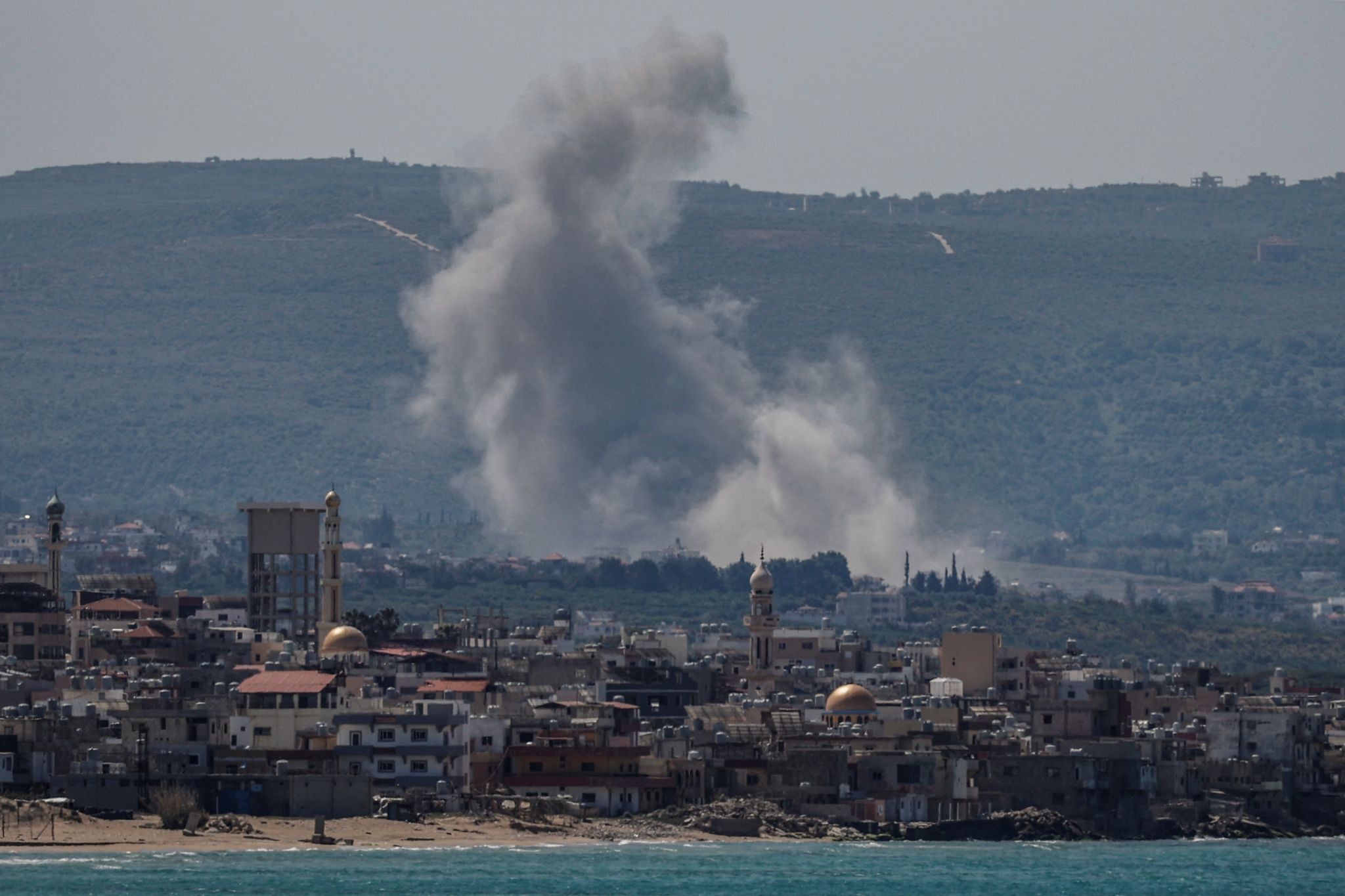 Smoke rises from a strike south of Tyre, Lebanon.