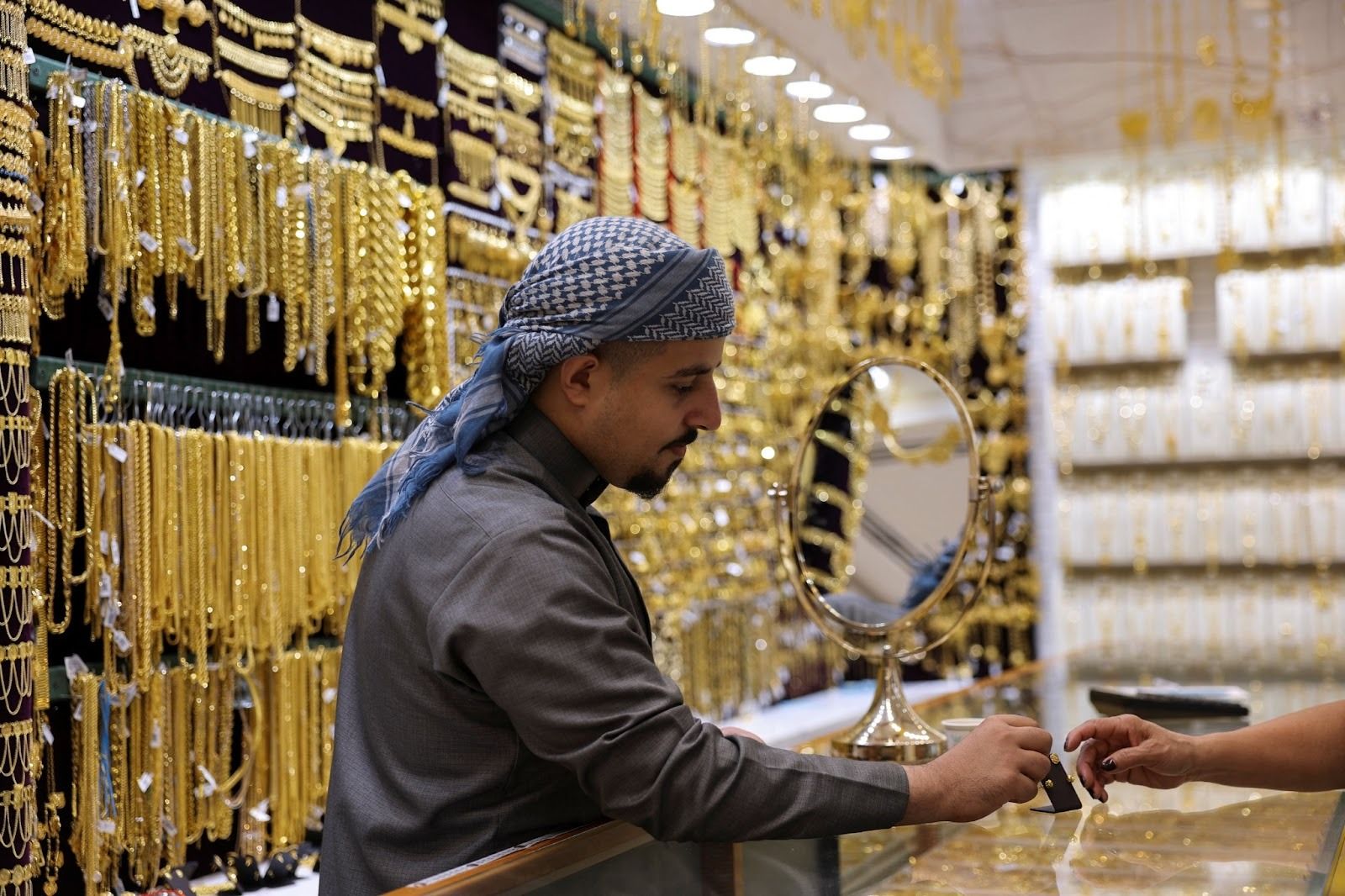Photo of a jeweler in Dubai’s Gold Souk.