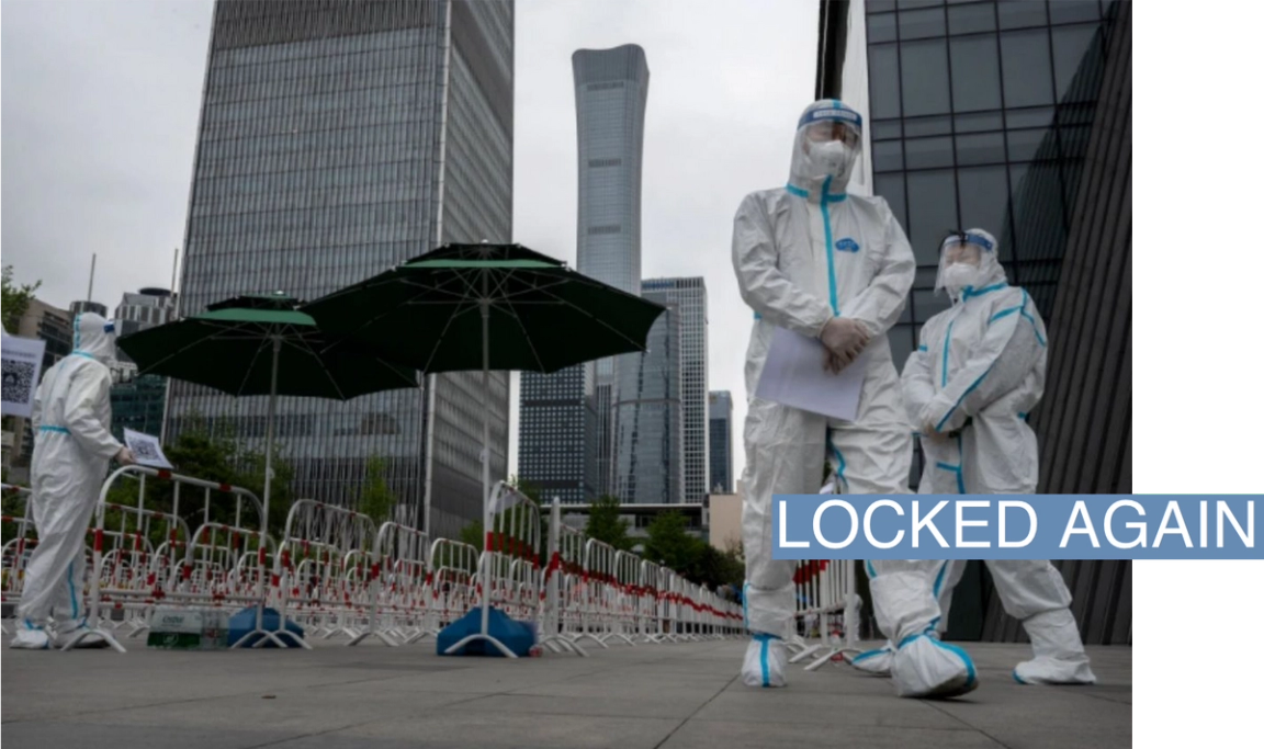 Chinese health workers in hazmat suits