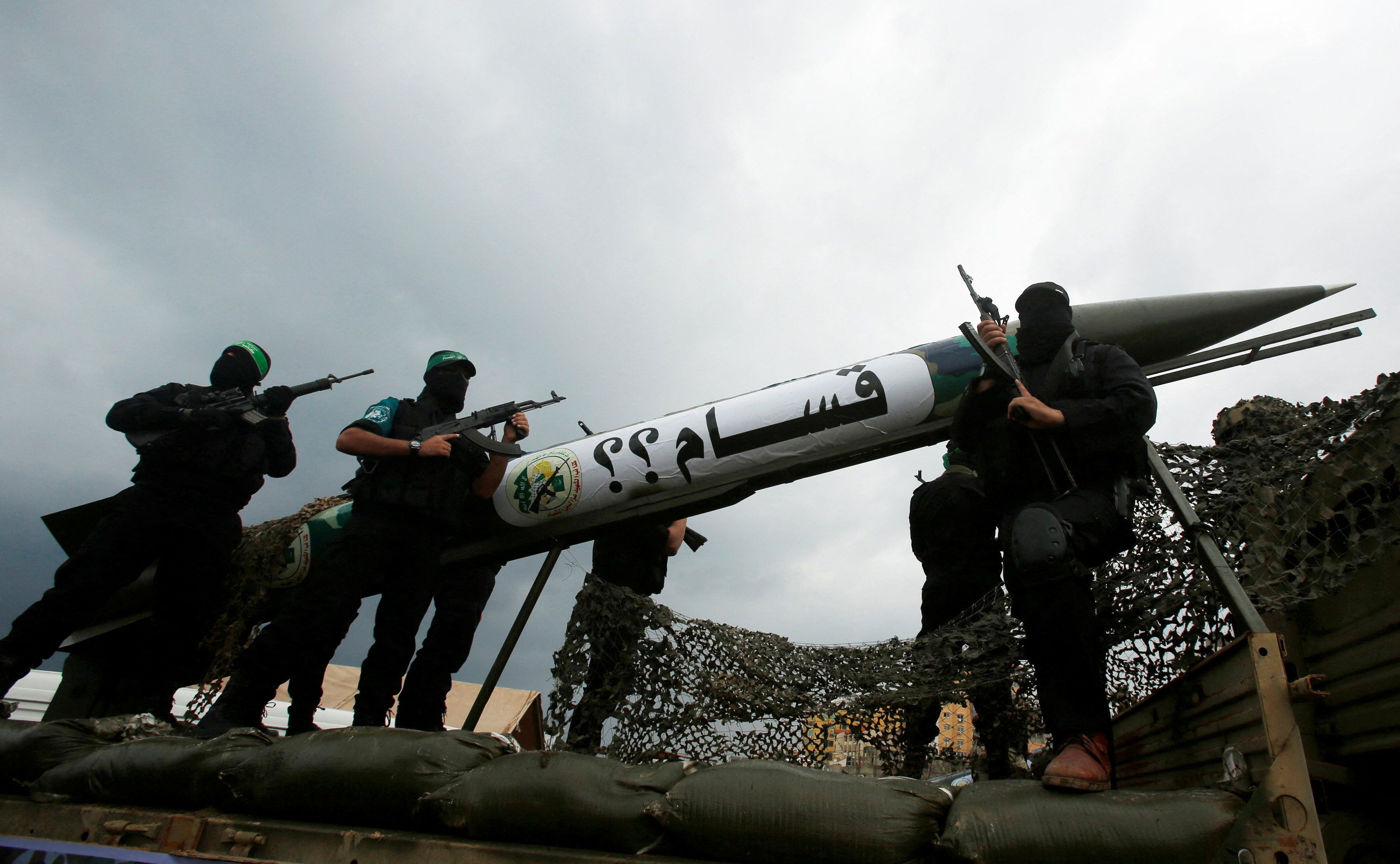 Palestinian members of al-Qassam Brigades, the armed wing of the Hamas movement