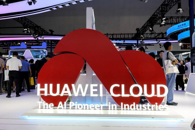 Huawei Cloud display at an AI convention.