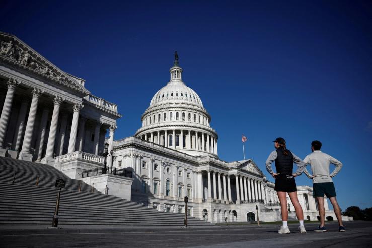 People look the US Capitol in Washington.