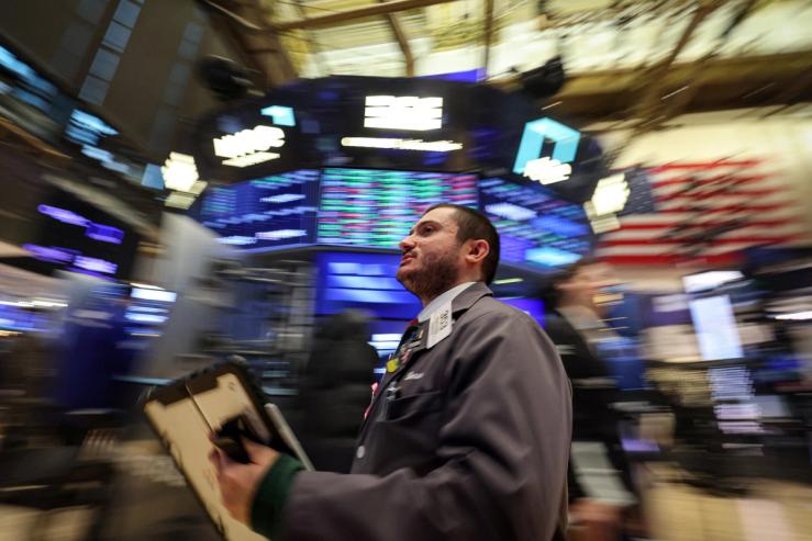 Traders on floor of New York Stock Exchange