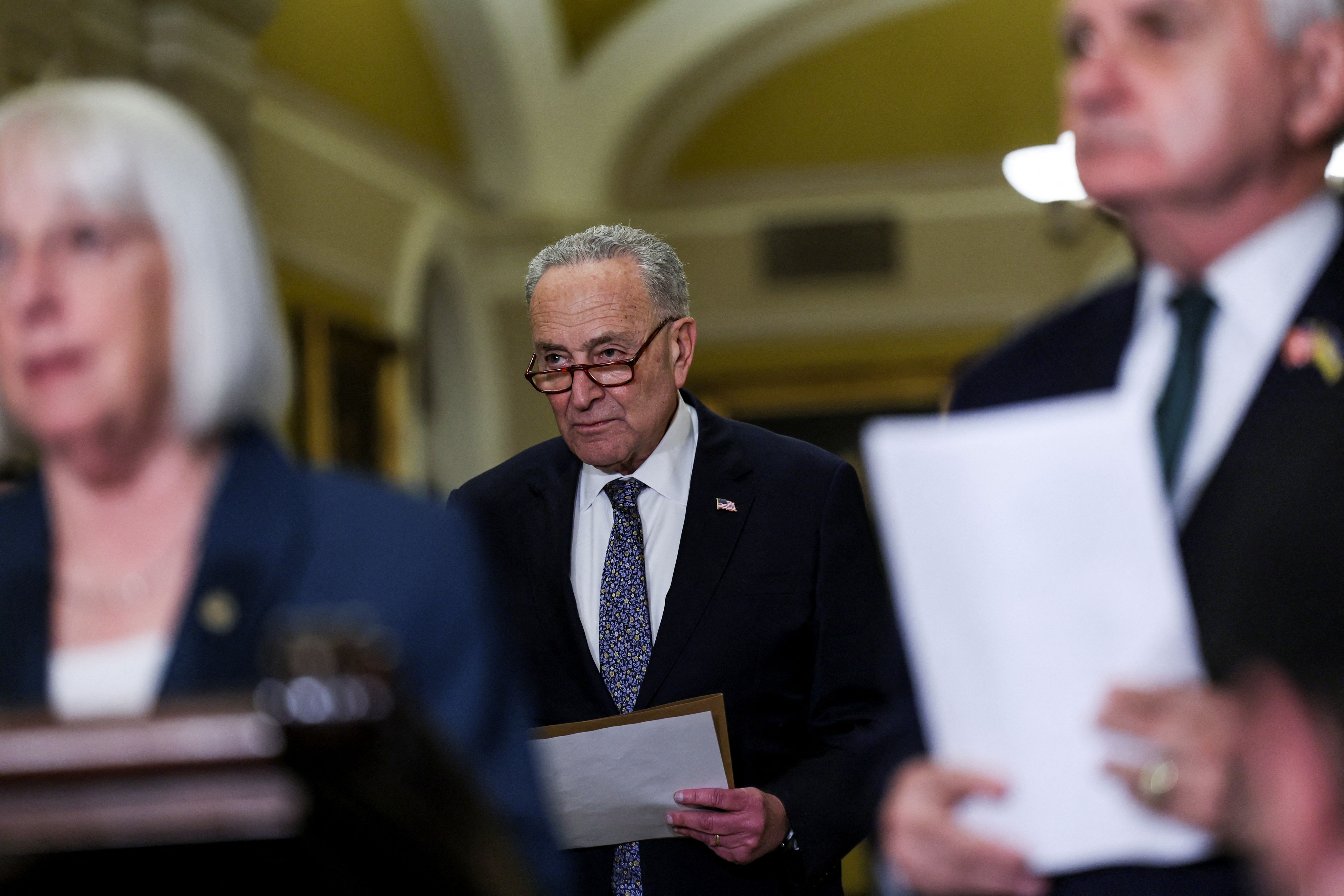  Senate Majority Leader Chuck Schumer (D-NY) attends a press conference, following a Senate Democrats weekly policy lunch, on Capitol Hill in Washington