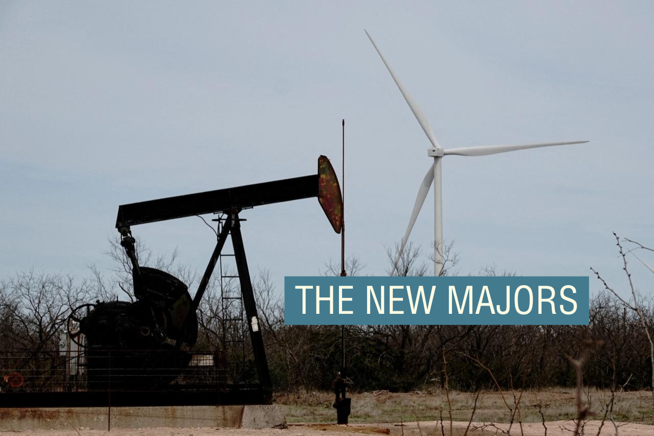 An oil pump jack and a wind turbine juxtaposed in Texas.