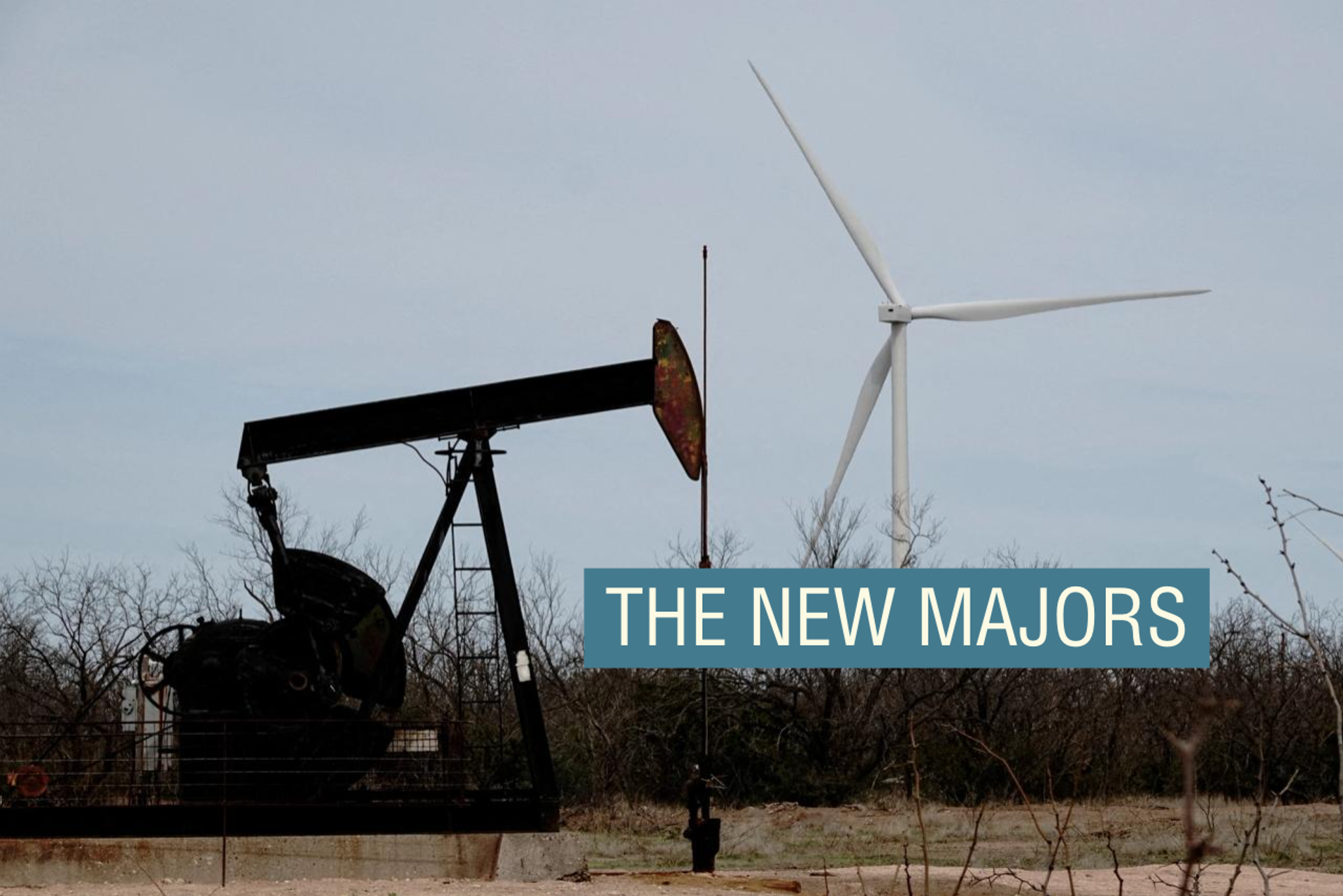 An oil pump jack and a wind turbine juxtaposed in Texas.