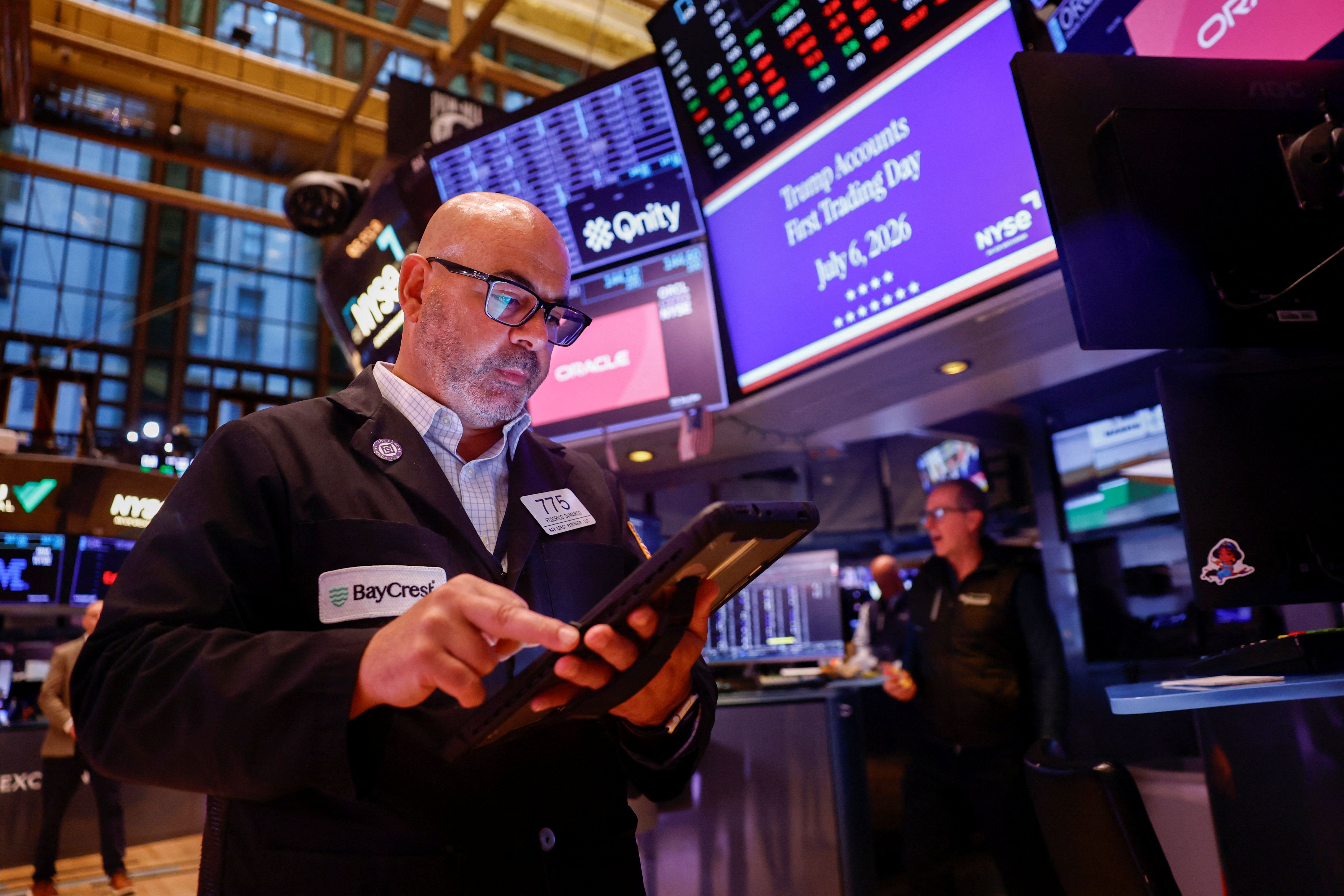 A trader works on the floor of the New York Stock Exchange