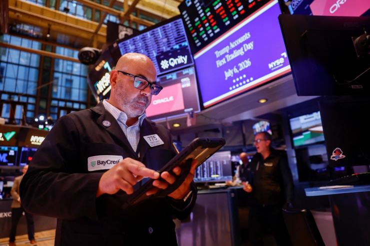 A trader works on the floor of the New York Stock Exchange